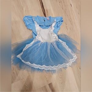 Alice in wonderland dress, hats and party decorations